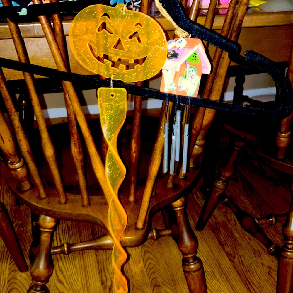 Halloween pair of 2. A ghost chime and twirler smiling jack o lantern